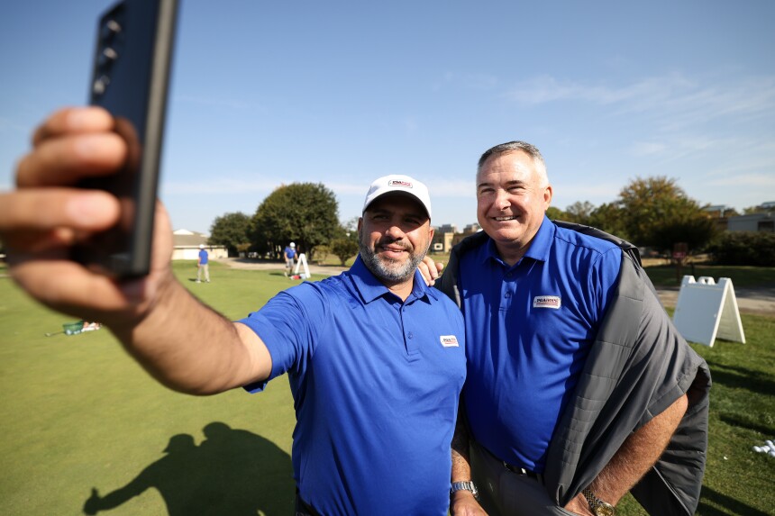 WASHINGTON, DC - OCTOBER 12: PGA HOPE Ambassador of New England Carlos Barbeiro takes a selfie with PGA of America Vice President Don Rea, PGA, after the Ambassador Golf Training during the PGA HOPE National Golf & Wellness Week at East Potomac Golf Course on Saturday, October 12, 2024 in Washington, D.C. (Photo by Scott Taetsch/PGA of America)