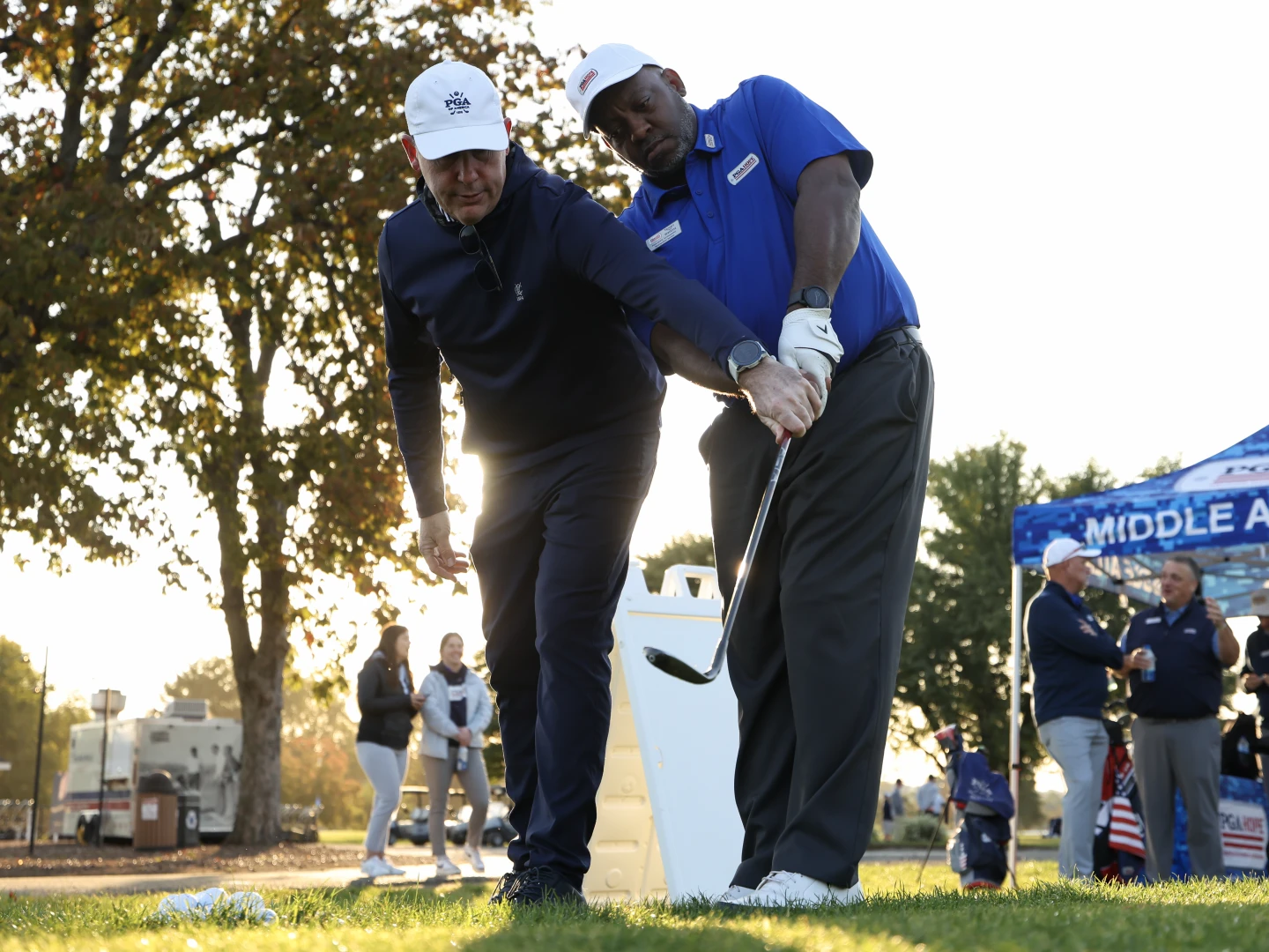 WASHINGTON, DC - OCTOBER 12: Jason Epstein, PGA, gives swing instructions to PGA HOPE Ambassador of the Metropolitan section Tamari Watkins at Ambassador Golf Training during the PGA HOPE National Golf & Wellness Week at East Potomac Golf Course on Saturday, October 12, 2024 in Washington, D.C. (Photo by Scott Taetsch/PGA of America)