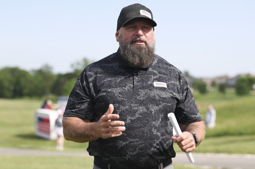 SIMPSONVILLE, KY - MAY 13: Chris Nowak speaks with attendees during the PGA HOPE Secretary's Cup at University of Louisville Golf Club on Monday, May 13, 2024 in Simpsonville, Kentucky. (Photo by Scott Taetsch/PGA of America)